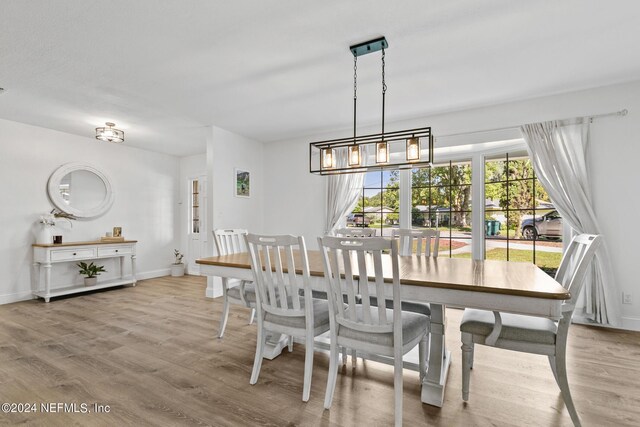 dining room featuring light hardwood / wood-style floors