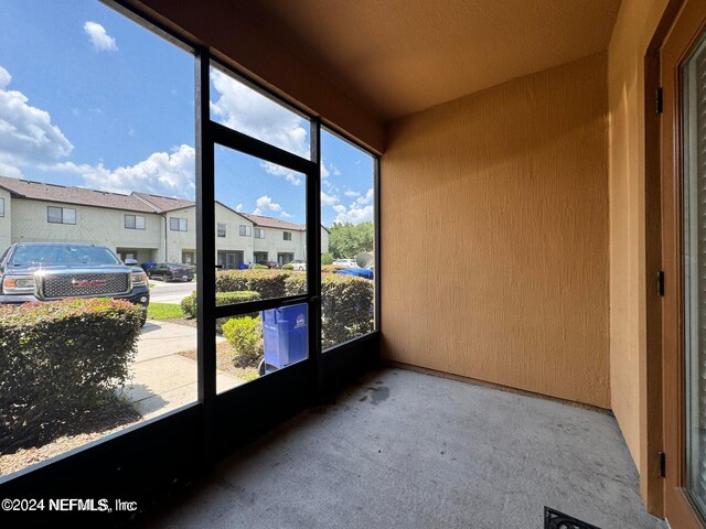 view of unfurnished sunroom