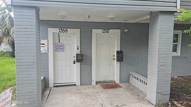 1359 W 22nd St, Jacksonville, FL 32209 - property entrance featuring brick siding