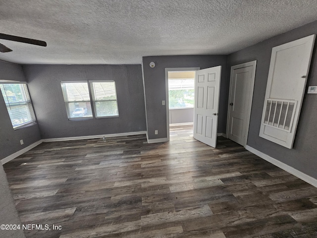 1359 W 22nd St, Jacksonville, FL 32209 - unfurnished room featuring ceiling fan, dark wood-style flooring, and a textured ceiling