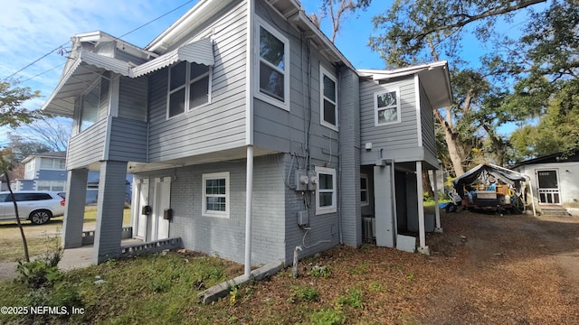 1359 W 22nd St, Jacksonville, FL 32209 - view of side of home with brick siding