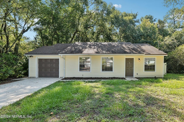 single story home with a front lawn and a garage