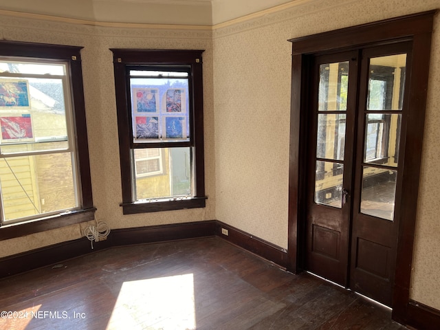 unfurnished room with dark hardwood / wood-style floors