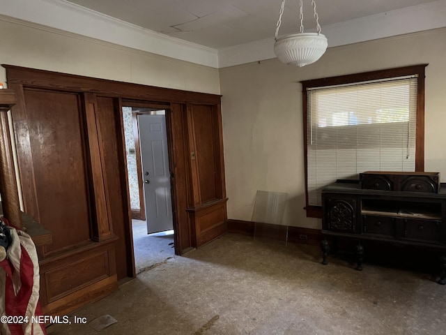 interior space featuring crown molding