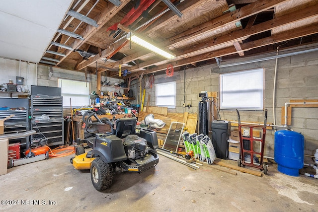 garage with a workshop area