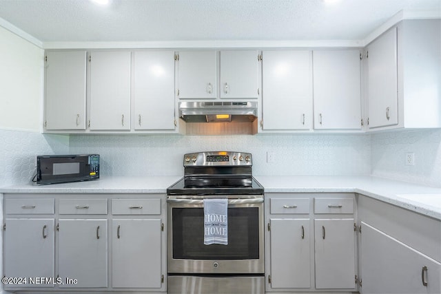 kitchen with white cabinetry, electric stove, and tasteful backsplash