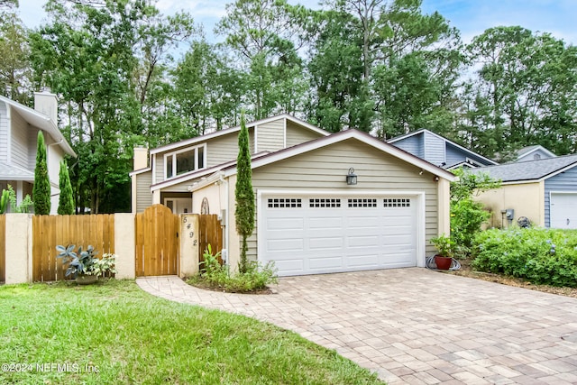 view of front property with a garage