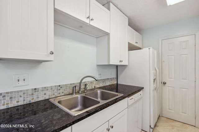 2696 Forest Ridge Dr Unit A-6, Fernandina Beach, FL 32034 - kitchen featuring dishwasher, white cabinetry, decorative backsplash, and light tile patterned floors