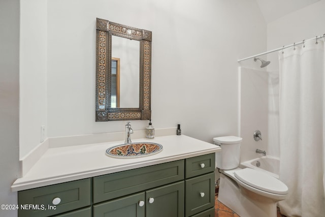 full bathroom featuring shower / bath combo, vanity, and toilet