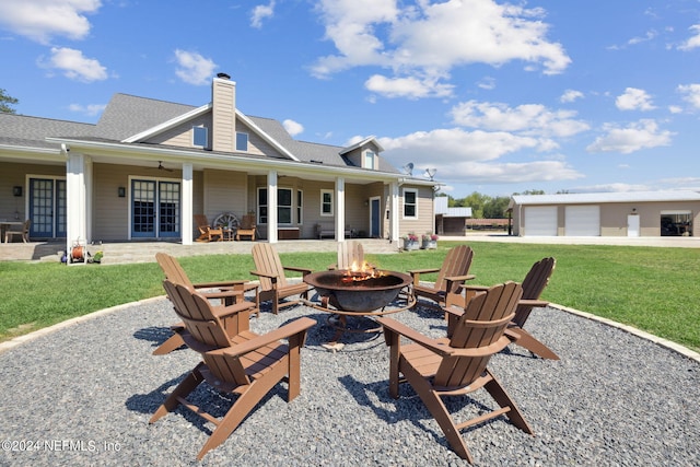 view of patio with a fire pit