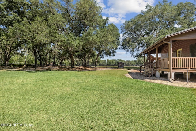 view of yard featuring a deck