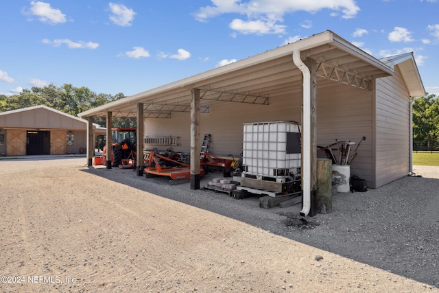 view of parking / parking lot with a carport