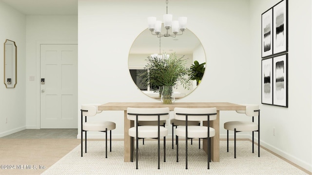 dining space featuring a notable chandelier