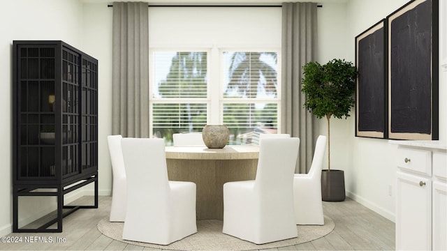 dining room with light wood-type flooring