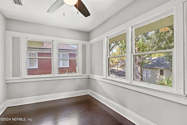 2859 Lydia St, Jacksonville, FL 32205 - unfurnished sunroom with baseboards, visible vents, and hardwood / wood-style flooring