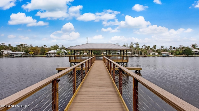 dock area with a water view and a gazebo