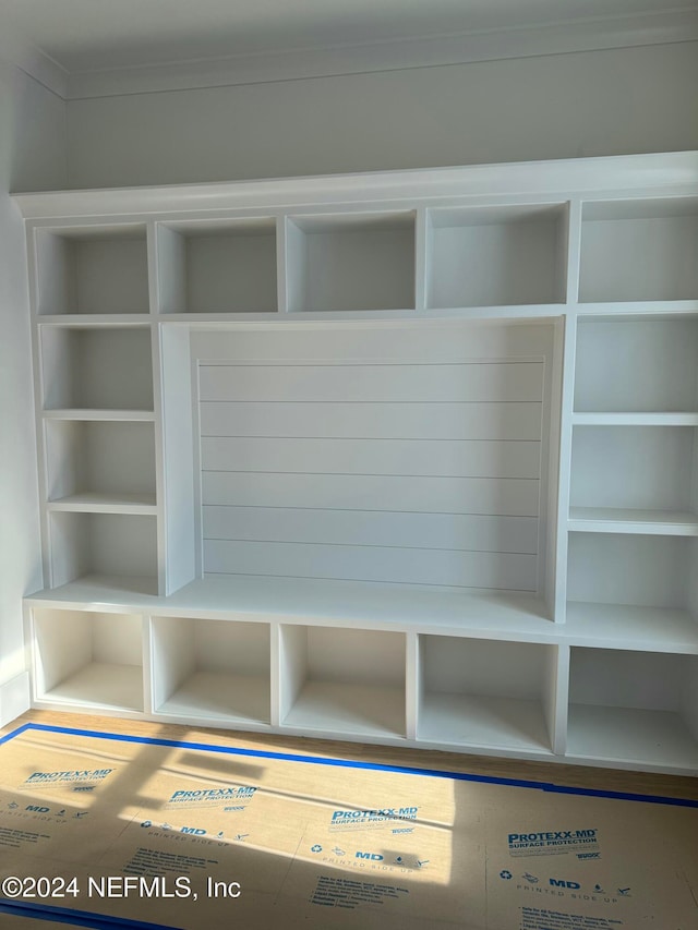 mudroom featuring crown molding