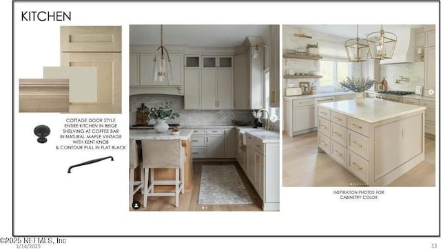 kitchen featuring glass insert cabinets, light countertops, a kitchen island, and decorative light fixtures