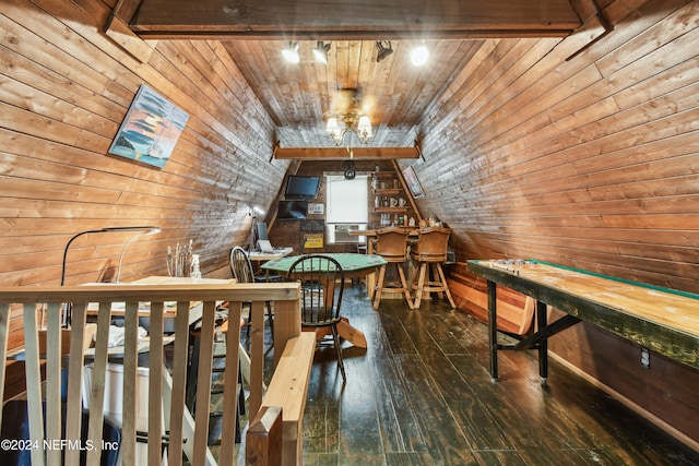 recreation room featuring wood ceiling, wood walls, vaulted ceiling with skylight, and dark wood-type flooring