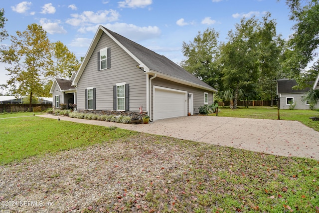 view of side of property with a lawn