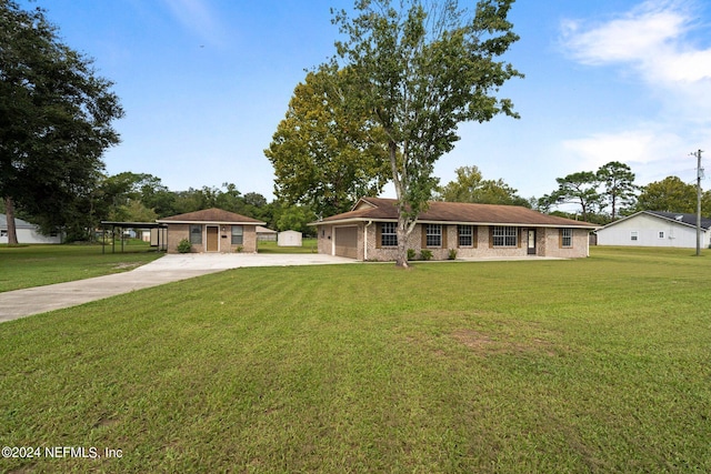 ranch-style house featuring concrete driveway, a garage, and a front lawn