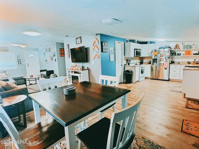 dining area featuring light hardwood / wood-style floors