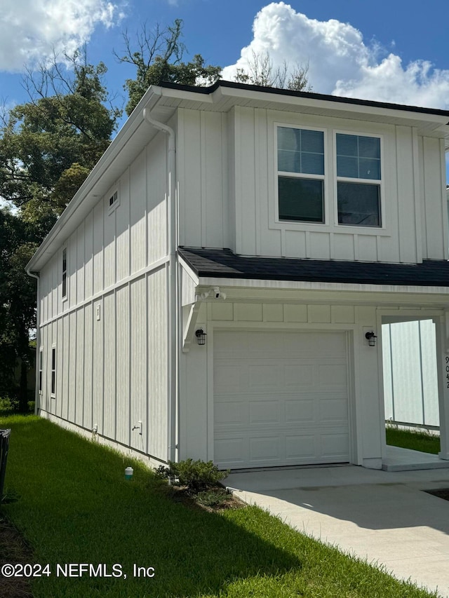 view of property exterior with a garage