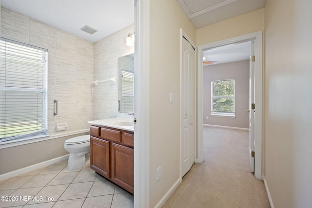 96316 Ridgewood Cir, Fernandina Beach, FL 32034 - full bathroom with vanity, toilet, baseboards, and shower / bathtub combination