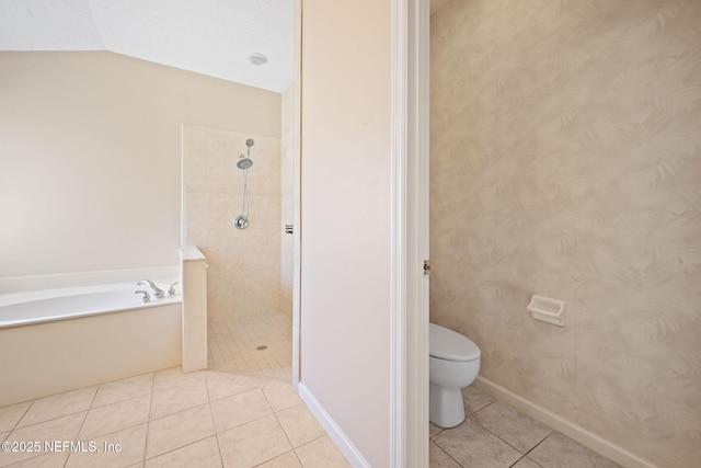 96316 Ridgewood Cir, Fernandina Beach, FL 32034 - bathroom with tile patterned flooring, a tile shower, toilet, a garden tub, and lofted ceiling