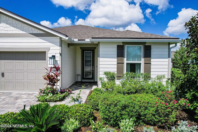 ranch-style home with a garage