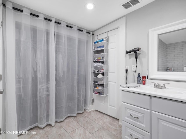 2745 Gilmore St, Jacksonville, FL 32205 - bathroom with a shower with shower curtain, visible vents, vanity, and recessed lighting