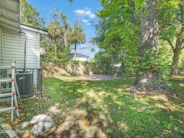 2745 Gilmore St, Jacksonville, FL 32205 - view of yard featuring central AC and fence