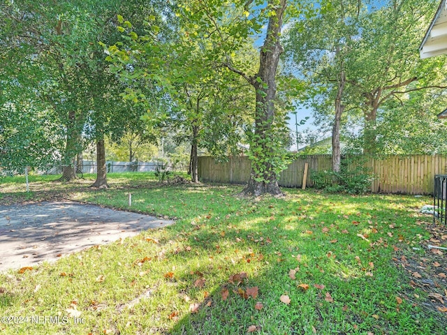 2745 Gilmore St, Jacksonville, FL 32205 - view of yard featuring a fenced backyard and a patio