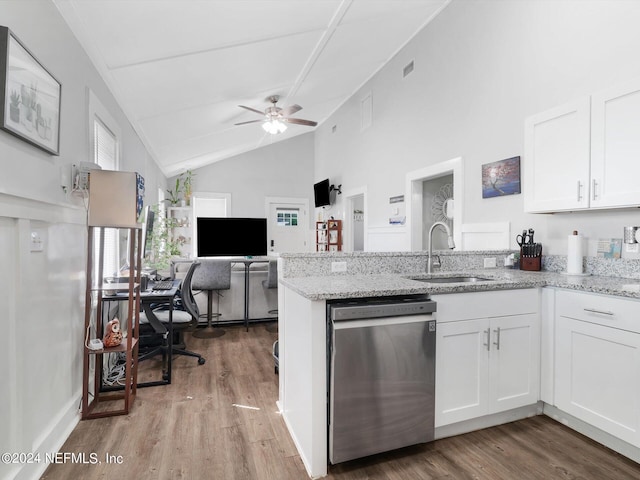 2745 Gilmore St, Jacksonville, FL 32205 - kitchen featuring a peninsula, a sink, white cabinetry, wood finished floors, and dishwasher