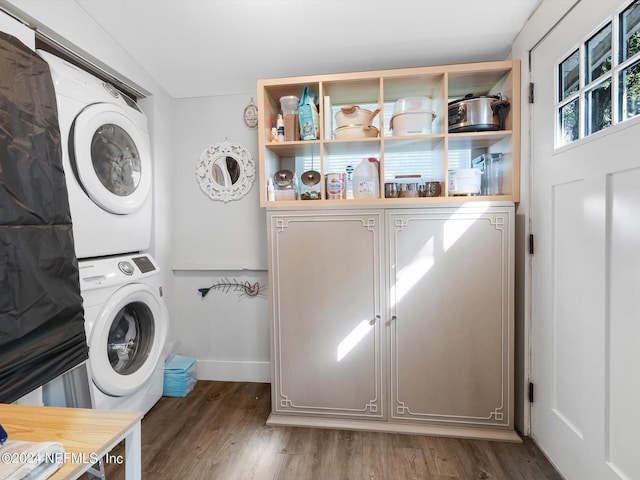 2745 Gilmore St, Jacksonville, FL 32205 - washroom with stacked washing maching and dryer, wood finished floors, and laundry area