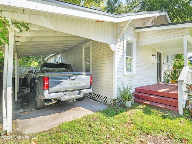 view of parking featuring a carport