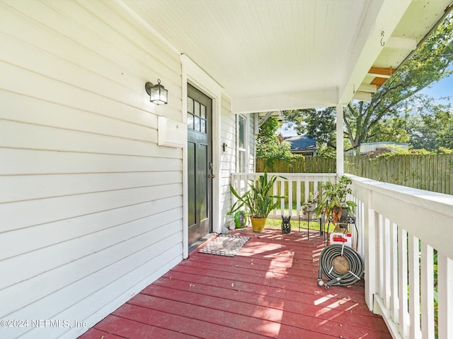 2745 Gilmore St, Jacksonville, FL 32205 - wooden deck with fence and covered porch