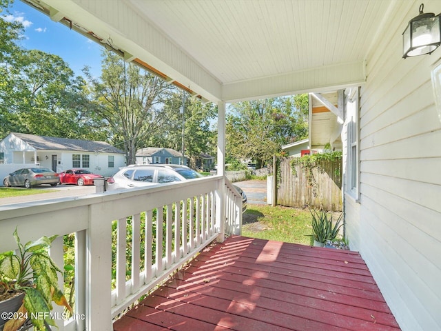2745 Gilmore St, Jacksonville, FL 32205 - deck featuring a porch and a residential view