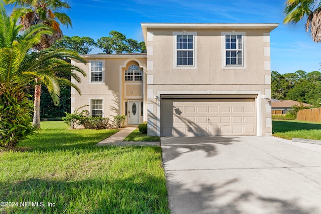 view of front facade featuring a garage and a front lawn