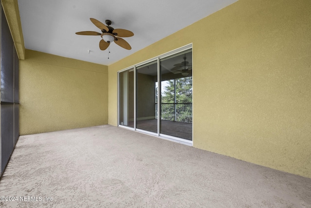 view of patio featuring ceiling fan