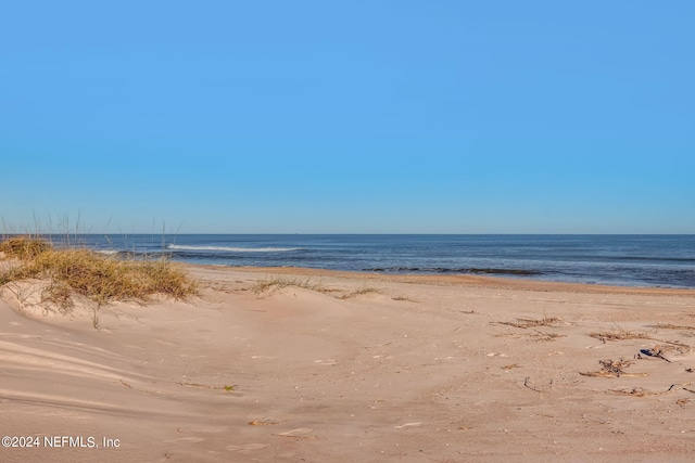 view of water feature featuring a beach view