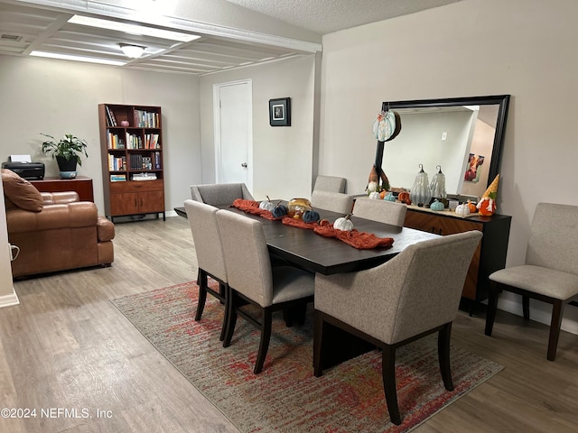 dining room featuring light hardwood / wood-style flooring