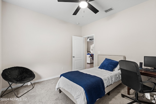 carpeted bedroom featuring ceiling fan