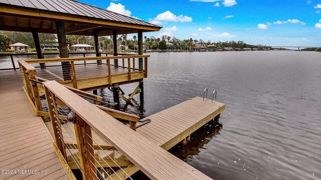 view of dock with a water view