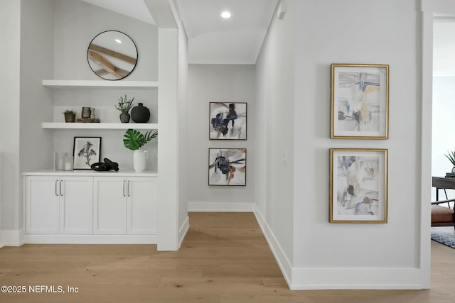354 River Breeze Dr Lot 3, Ponte Vedra, FL 32081 - corridor with baseboards, light wood-style flooring, built in features, and recessed lighting