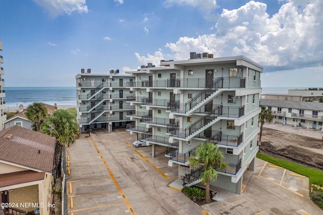 view of building exterior with a water view