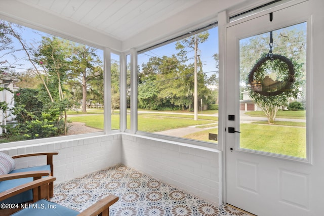 sunroom with a healthy amount of sunlight