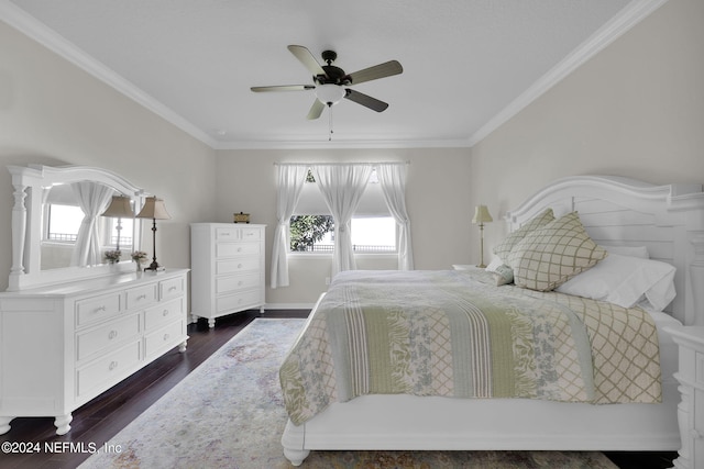 bedroom featuring ceiling fan, dark hardwood / wood-style flooring, and crown molding