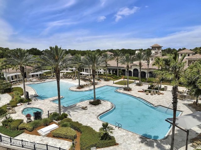 view of swimming pool with a patio area