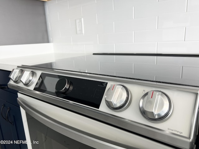 room details with stainless steel electric range oven